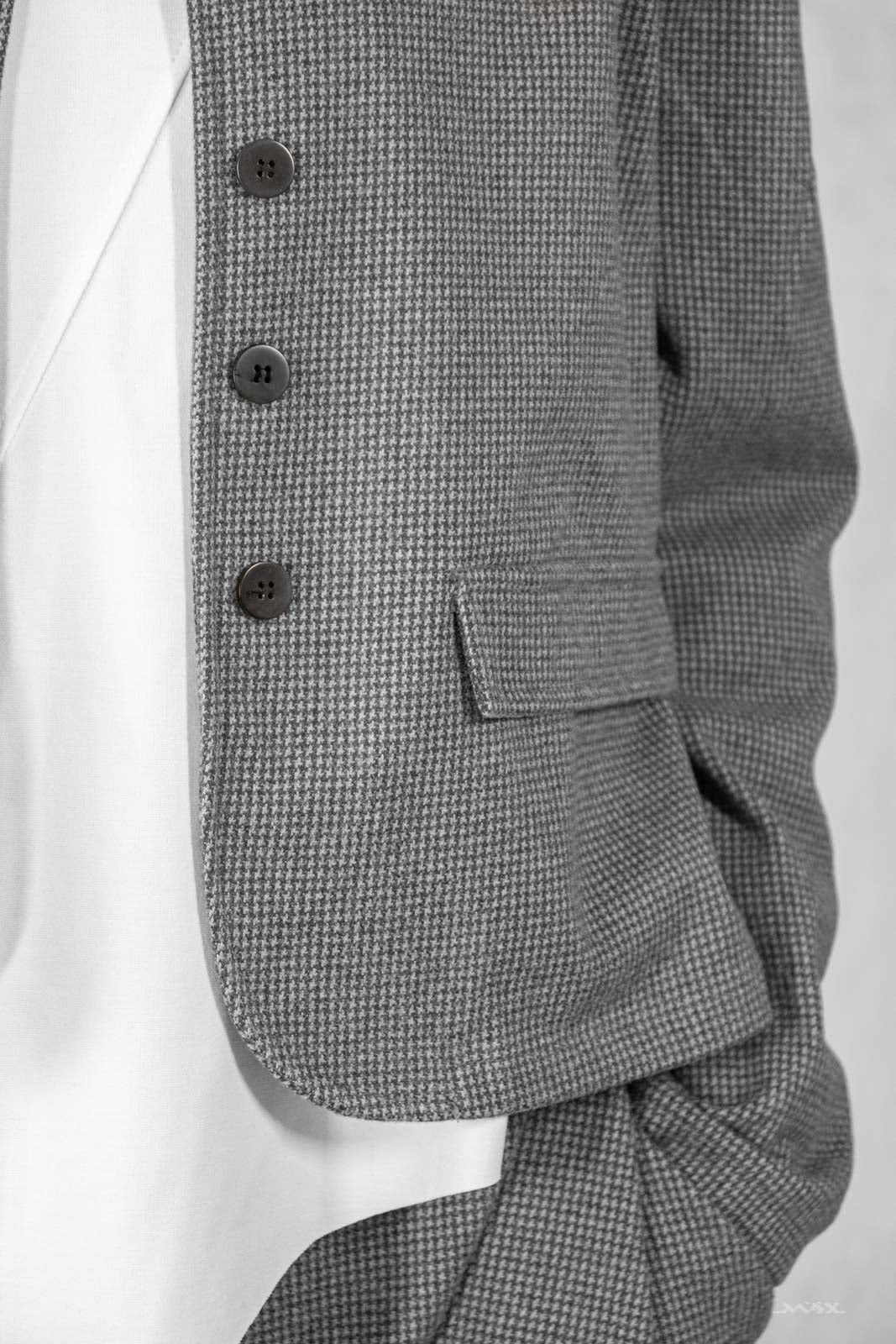 Jasje van grijze tweedstof – one size (38–44)