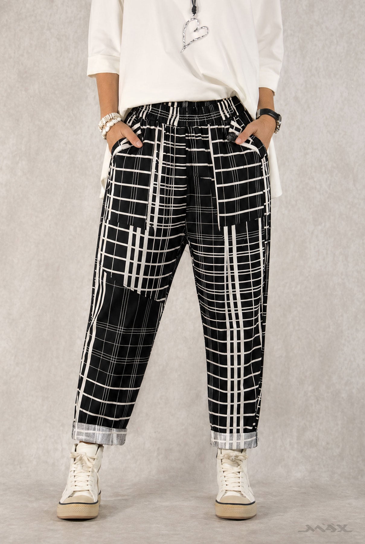 Pantalon noir et blanc à carreaux, taille unique (36–40)